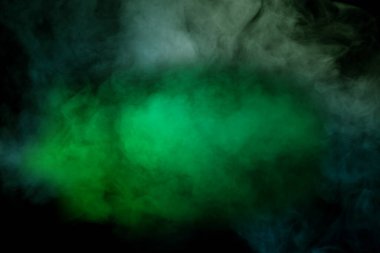 Siyah arka planda mavi ve sarı buhar. Boşluğu kopyala.