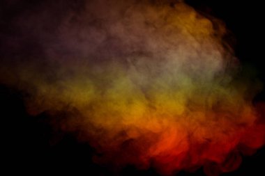 Siyah arka planda mavi ve sarı buhar. Boşluğu kopyala.