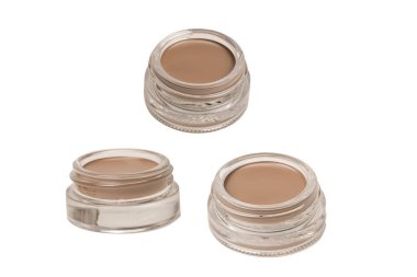 A brow pomade in blonde shade with brush isolated on a white background. Make up. 