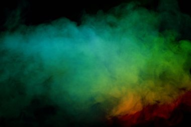 Siyah arka planda mavi ve sarı buhar. Boşluğu kopyala.