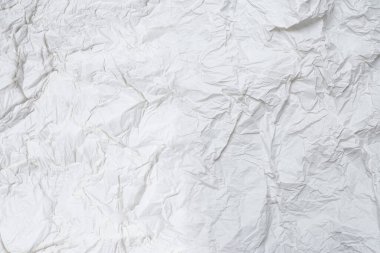 Buruşmuş beyaz kağıt arka plan. Üst görünüm. 
