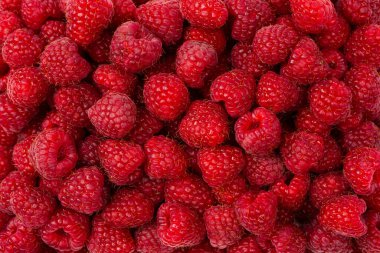 Arka plan olarak lezzetli taze ahududu. Üst görünüm.  