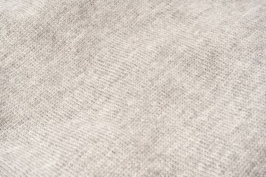 Arka plan olarak gri yün süveter dokusu. Üst görünüm.