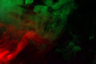 Siyah arka planda kırmızı buhar. Boşluğu kopyala.