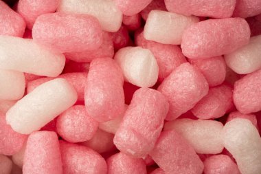 Arkaplan olarak pembe ve beyaz kutu doldurucu. Üst görünüm. 