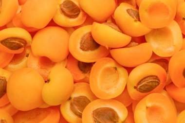 Olgun sulu portakal kayısı dilimler meyve arkaplanı. 