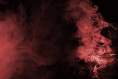 Siyah arka planda kırmızı buhar. Boşluğu kopyala.