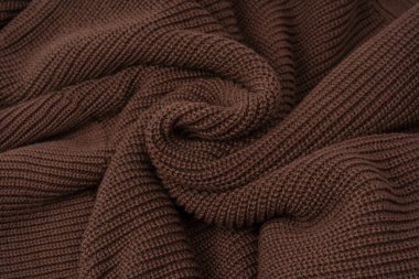 Arka plan olarak kahverengi süveter dokusu. Üst görünüm. 