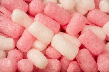 Arkaplan olarak pembe ve beyaz kutu doldurucu. Üst görünüm. 