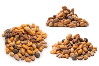 Lezzetli tuzlu fındık karışımı. Bir grup badem, fıstık, ceviz, macadamia, kaju..