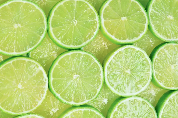 Arkaplan olarak taze limon dilimleri. 