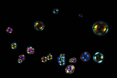 Sabun köpükleri siyah arka planda izole edilmiş. Boşluğu kopyala. 