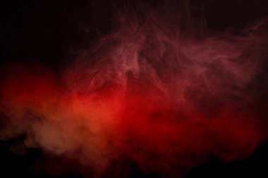 Siyah arka planda sarı ve pembe buhar. Boşluğu kopyala.