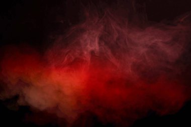 Siyah arka planda sarı ve pembe buhar. Boşluğu kopyala.