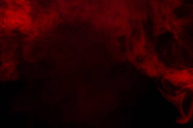 Siyah arka planda kırmızı buhar. Boşluğu kopyala.