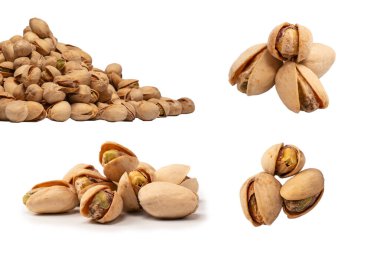 Beyaz arka planda izole edilmiş lezzetli fıstıklar..