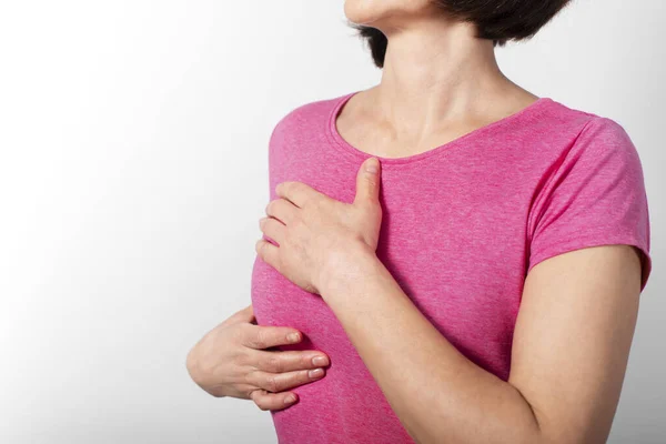 stock image Middle aged caucasian woman doing breast self examination