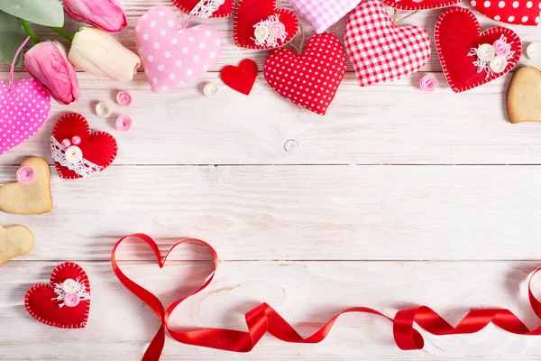 Sewed Handmade Fabric Hearts Tulips Ribbon Cookies Valentine Day White 免版税图库照片