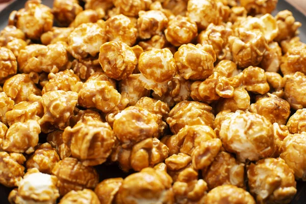 Caramelized sweet popcorn flakes gluten free food background