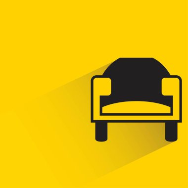 sofa with shadow on yellow background