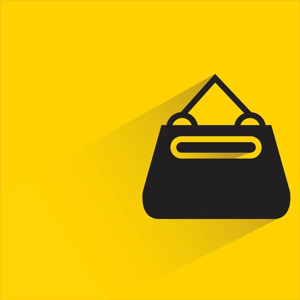 黄色の背景に影のファッションバッグ — ストックベクタ