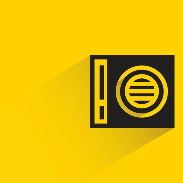 Sarı Arkaplanda Gölgesi Olan Radyo — Stok Vektör