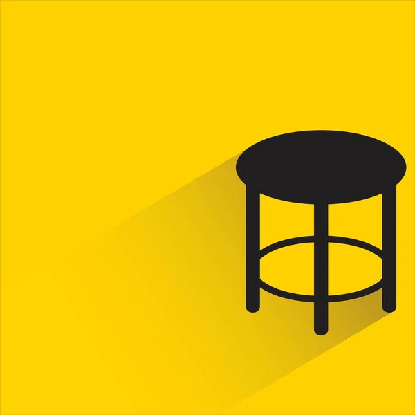黄色の背景に影の椅子 — ストックベクタ
