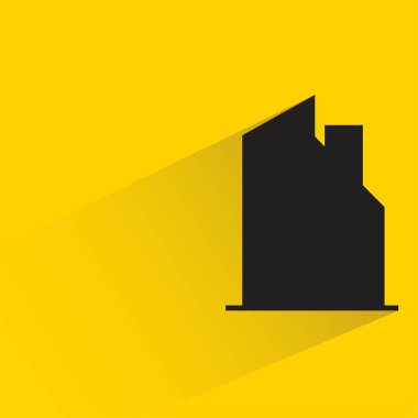 Sarı arkaplanda gölgesi olan siluet ofis binası simgesi
