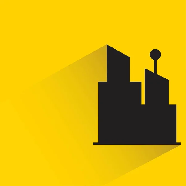 Silhouette Stadtbau Symbol Mit Schatten Auf Gelbem Hintergrund — Stockvektor