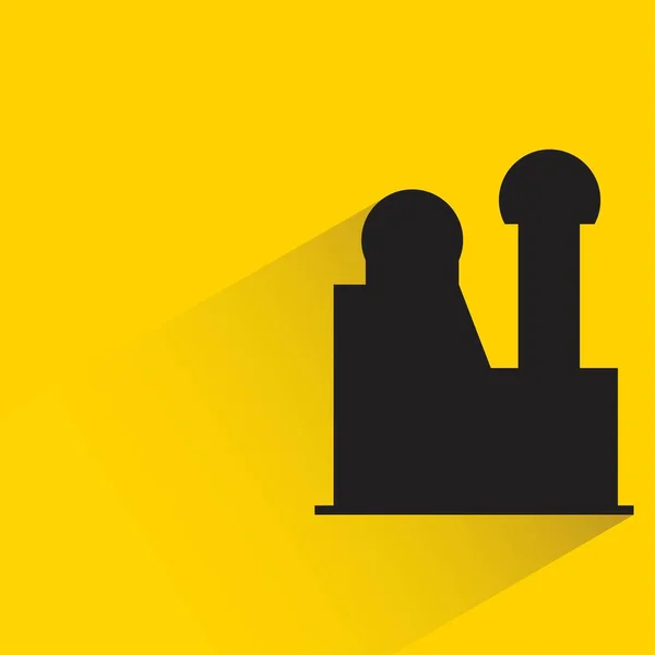 Silueta Icono Del Edificio Ciudad Con Sombra Sobre Fondo Amarillo — Vector de stock