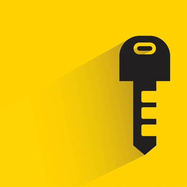Schlüssel Mit Schatten Auf Gelbem Hintergrund — Stockvektor