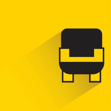 sofa with shadow on yellow background