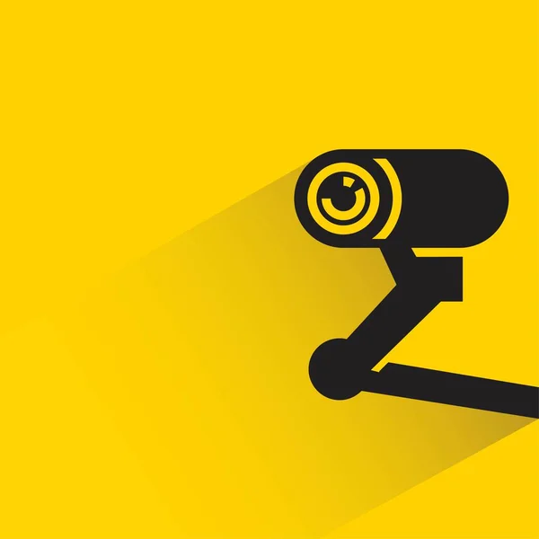 Security Camera Shadow Yellow Background — Stockvector