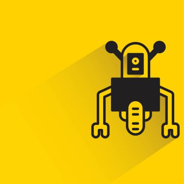 Sarı arka planda gölgesi olan droid robot.