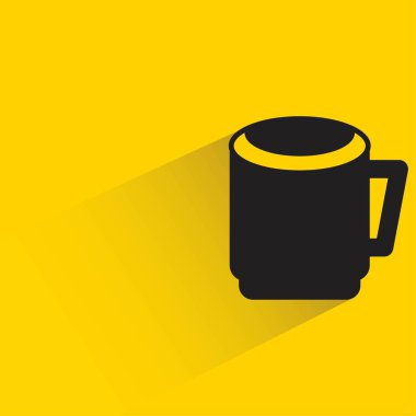 coffee cup with shadow on yellow background