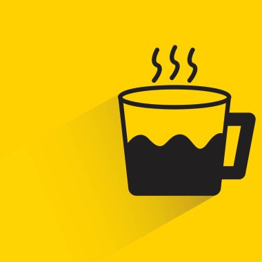 coffee cup with shadow on yellow background