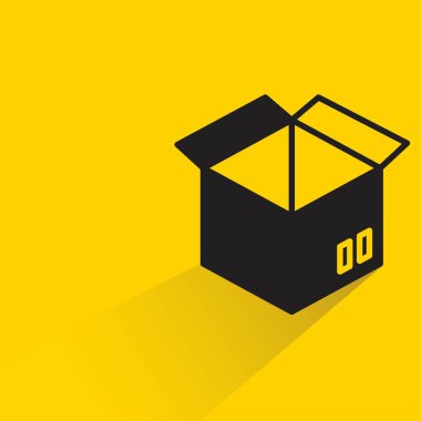 Sarı arka planda gölgesi olan karton kutu