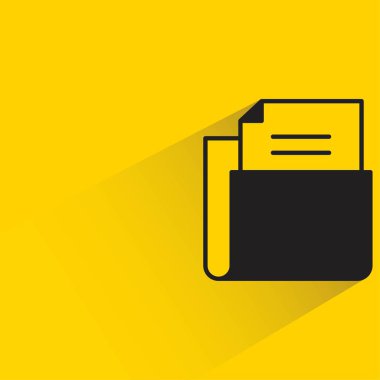 document in folder with shadow on yellow background