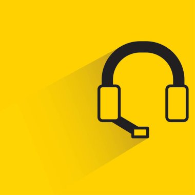 Sarı arkaplanda gölgesi olan kulaklık simgesi