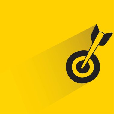 arrow dart with shadow on yellow background