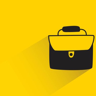 Sarı arka planda gölgesi olan karalama çantası