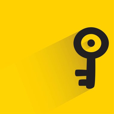 Sarı arkaplanda gölgesi olan karalama anahtarı