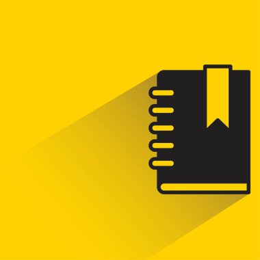 Sarı arkaplanda gölgesi olan kitap simgesi
