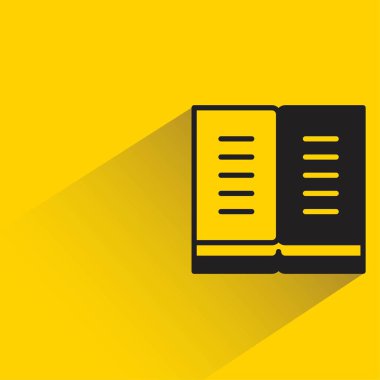 Sarı arkaplanda gölgesi olan kitap simgesi