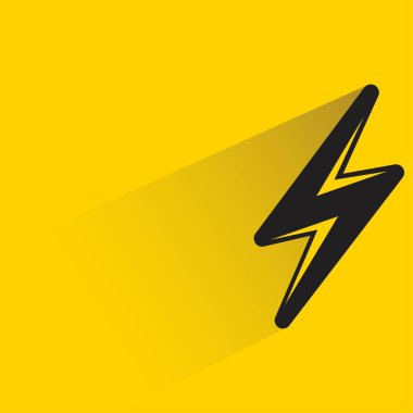 Sarı arkaplanda gölgesi olan şimşek sembolü