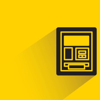 sarı arkaplanda gölgesi olan atm simgesi