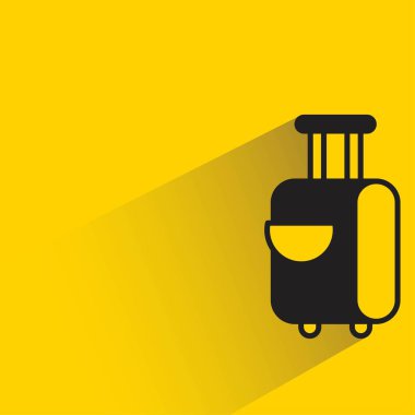 sarı arkaplanda gölgesi olan bagaj simgesi