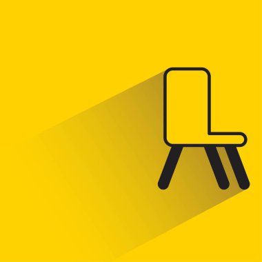 Sarı arkaplanda gölgesi olan sandalye simgesi