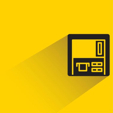 sarı arkaplanda gölgesi olan atm simgesi