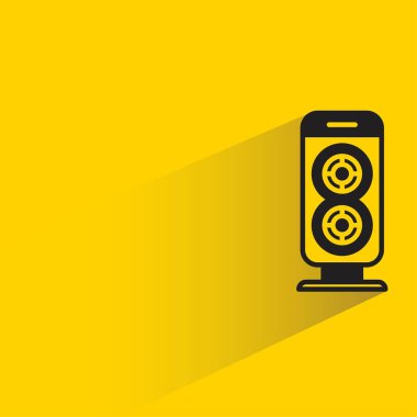 audio loudspeaker with shadow on yellow background